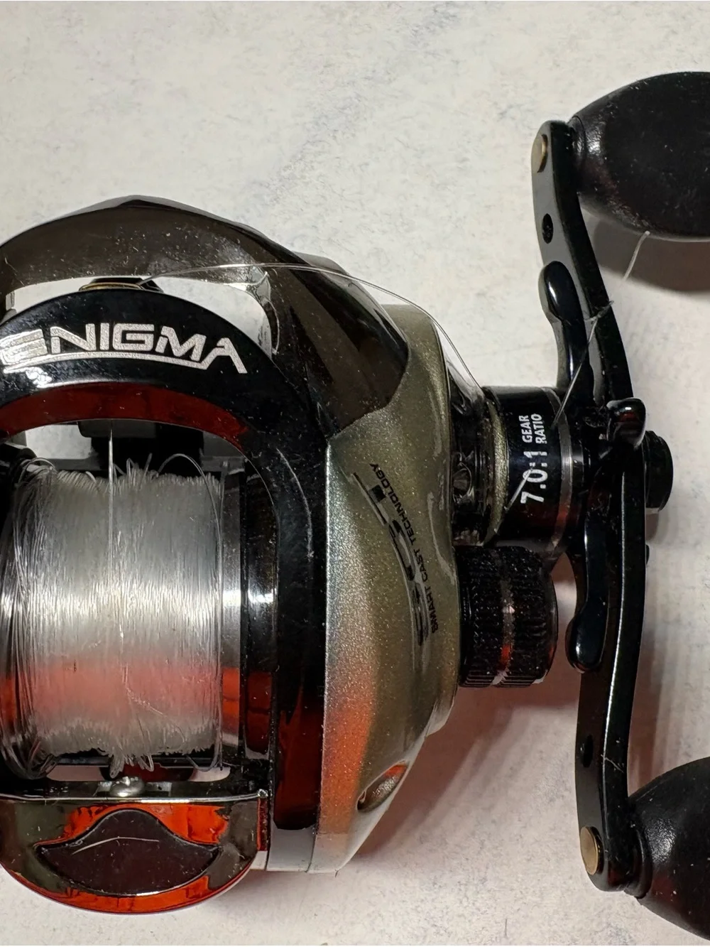 Bass Pro Shops Enigma Smart Cast Reel - Black and Gold - Picture 4 of 10
